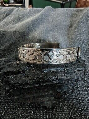 Silver Tone Coach Logo-Pattern Hinged Bracelet